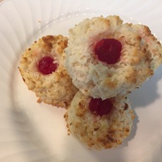 Gluten free Coconut macaroon
Coconut mixed with sweeten condensed milk and added cherry toasted just slightly with a fudge texture inside.